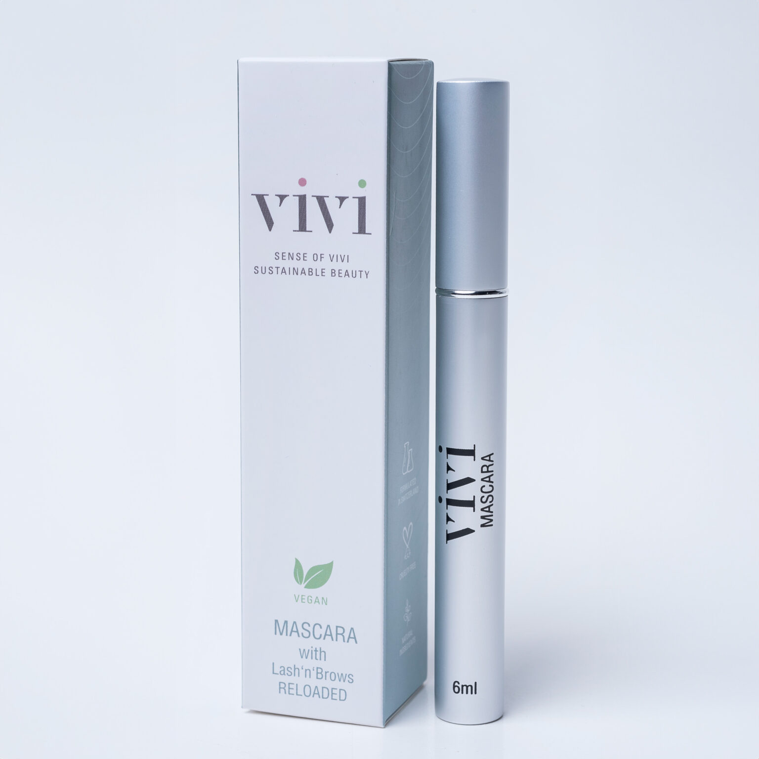 White cosmetic box and a silver mascara tube standing side by side, labeled Vivi vegan mascara with 6ml capacity.