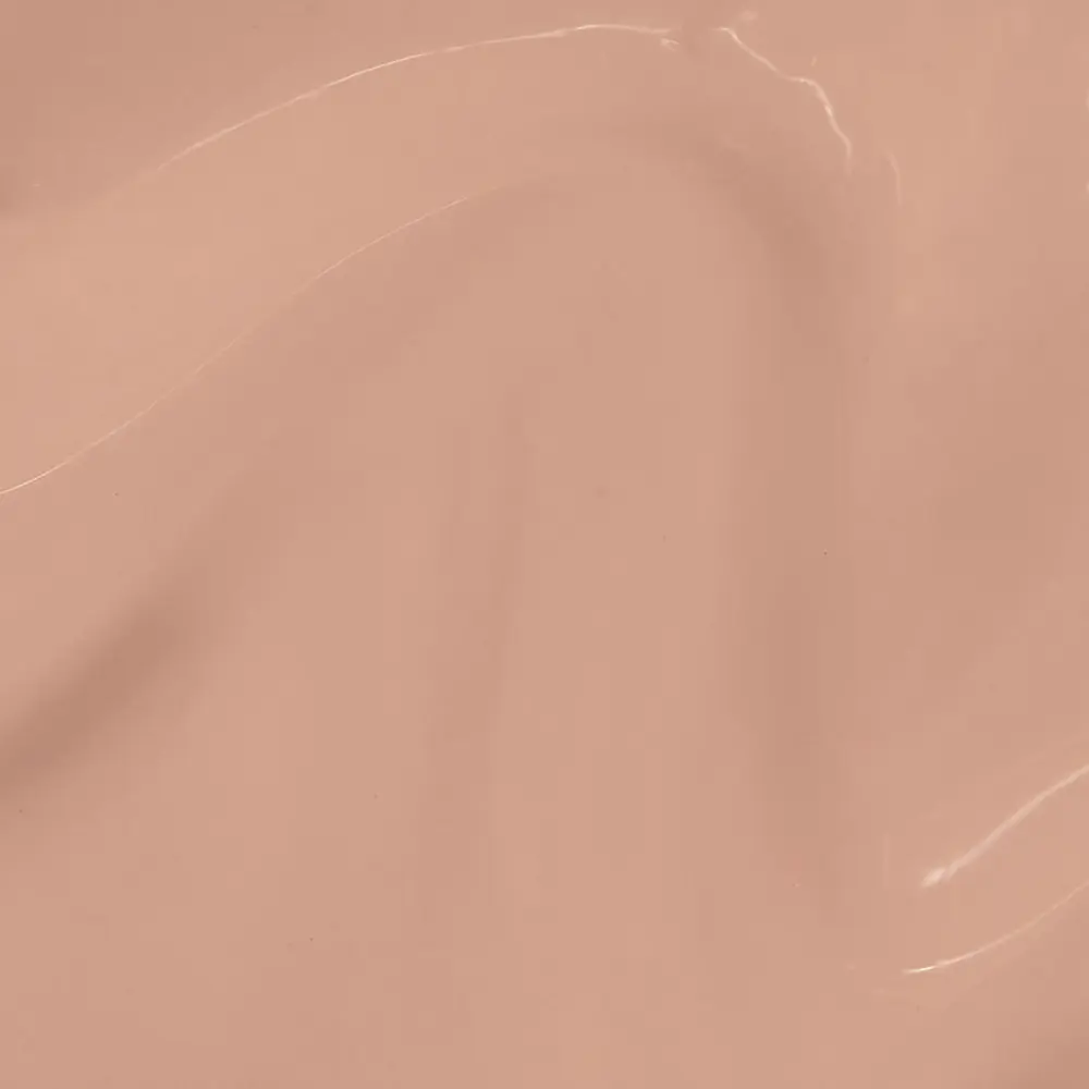 Abstract peach-colored background with soft curves and light white streaks, an abstract texture.
