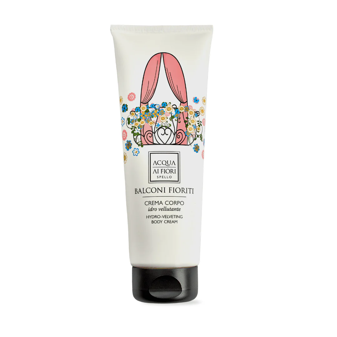 White tube of Balconi Fioriti hydro-velveting body cream with a colorful floral illustration and a pink bow on top, black cap at the bottom