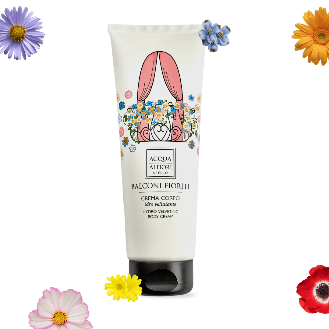 White tube of Balconi Fioriti hydro-velveting body cream with a floral illustration, set against a white background with colorful flowers around it.