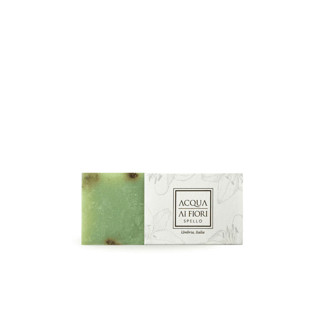 Green and white boxed soap bar with a black-framed label reading 'ACQUA AI FIORI' and 'Umbria, Italia' on a white patterned background