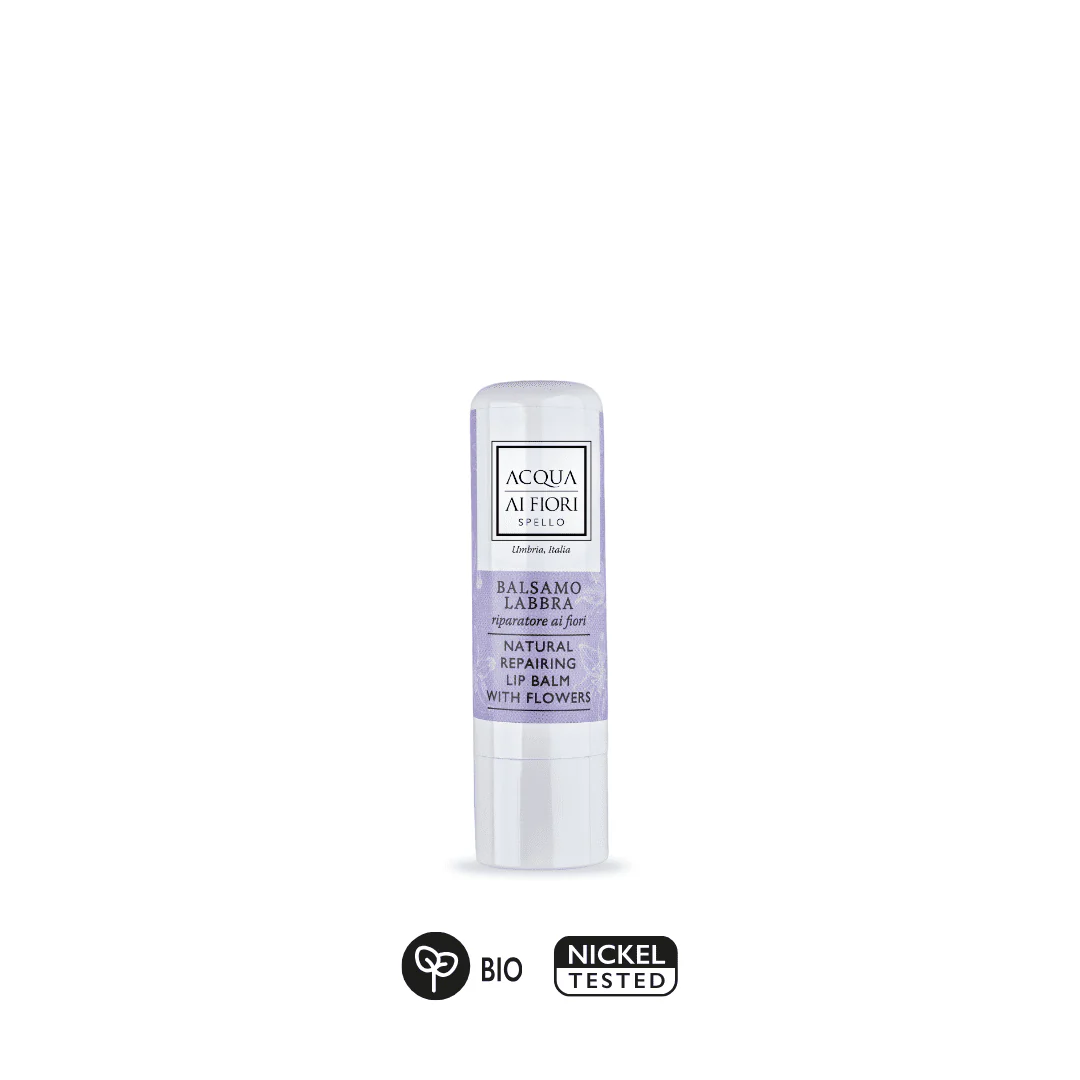 Lip balm tube labeled Acqua Ai Fiori with lavender packaging; BIO and Nickel Tested icons shown beneath.
