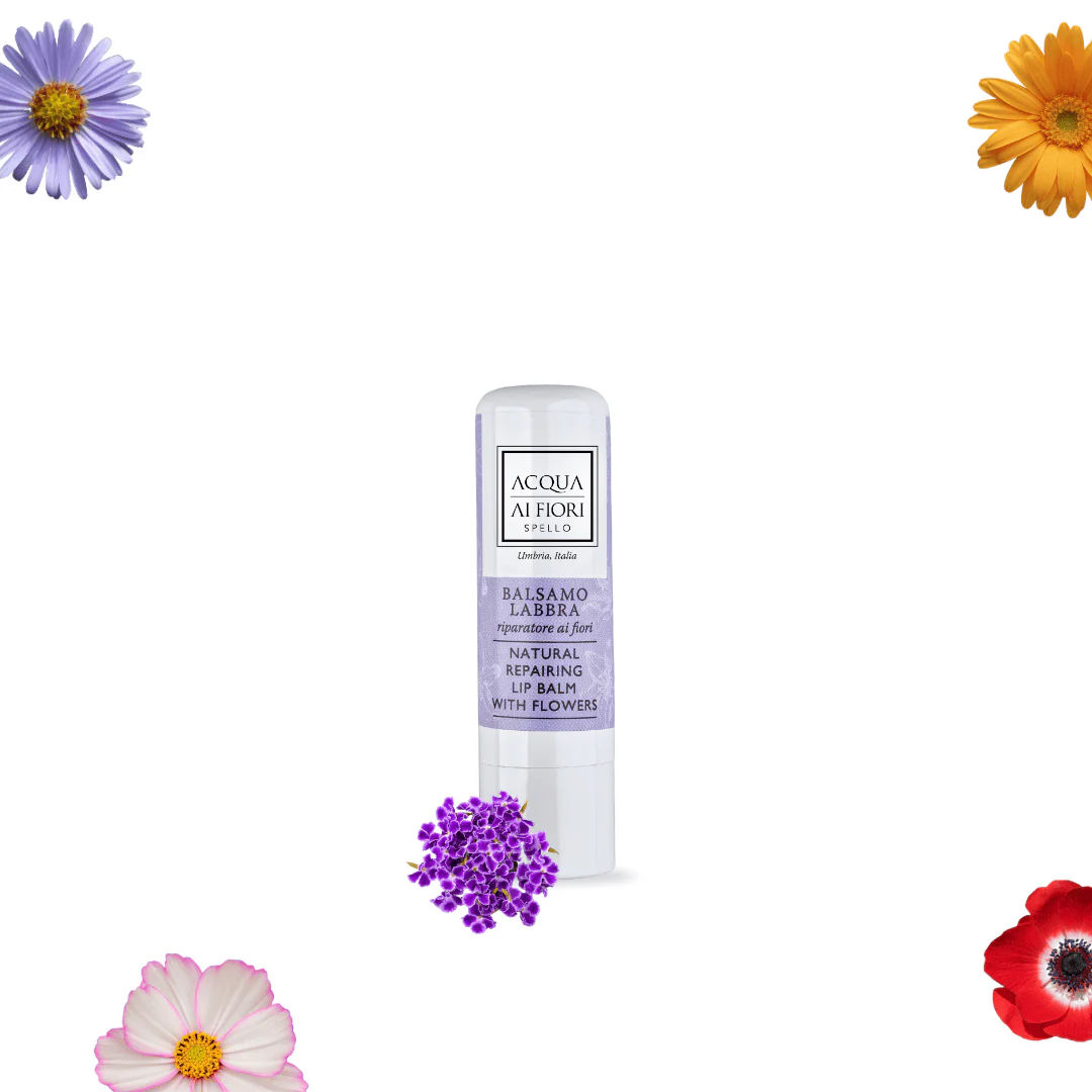 Lip balm tube with lavender label that reads 'Acqua ai Fiori' surrounded by colorful flowers on a white background, centered image.