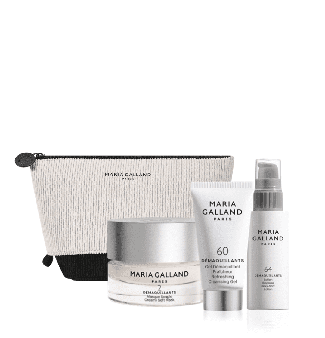 Maria Galland Paris skincare set with a beige pouch and four white-silver tubes and jars.