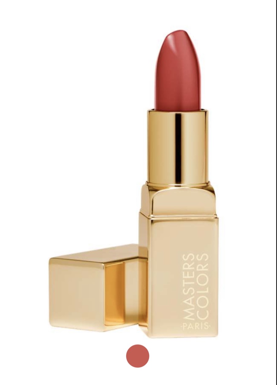 Red lipstick in a gold, open tube on a white background; branding reads Masters Colors Paris.